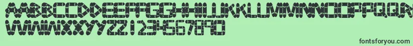 Tabla Font – Black Fonts on Green Background