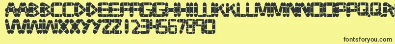 Tabla Font – Black Fonts on Yellow Background