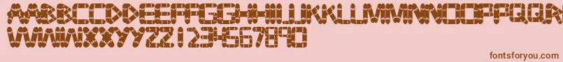 Tabla Font – Brown Fonts on Pink Background