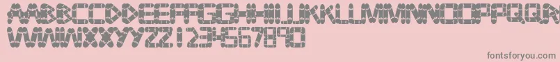 Tabla Font – Gray Fonts on Pink Background
