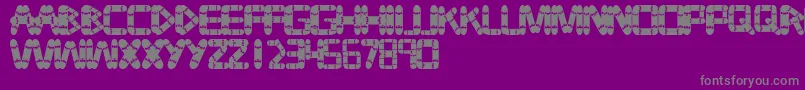 Fonte Tabla – fontes cinzas em um fundo violeta