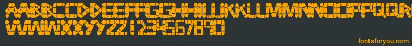 Tabla Font – Orange Fonts on Black Background