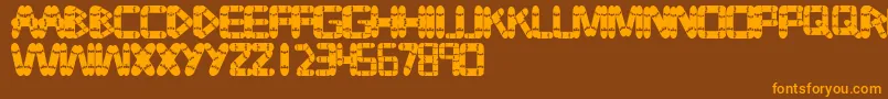 Tabla Font – Orange Fonts on Brown Background