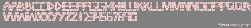 Tabla-Schriftart – Rosa Schriften auf grauem Hintergrund