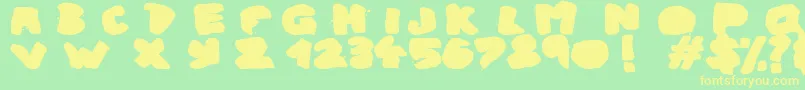 UrbanGhost Font – Yellow Fonts on Green Background