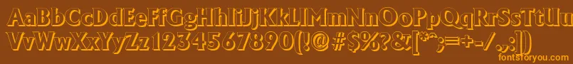 フォントAdelonshadowXboldRegular – オレンジ色の文字が茶色の背景にあります。