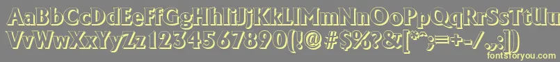Шрифт AdelonshadowXboldRegular – жёлтые шрифты на сером фоне