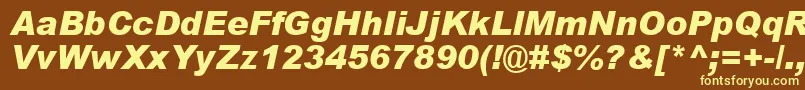 ArialBlackРљСѓСЂСЃРёРІ-Schriftart – Gelbe Schriften auf braunem Hintergrund