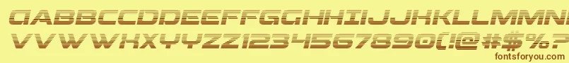 フォントBeamweapongradital – 茶色の文字が黄色の背景にあります。
