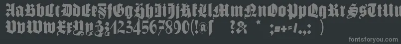 フォントSchmalegotischmk – 黒い背景に灰色の文字