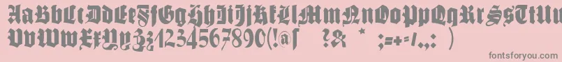 フォントSchmalegotischmk – ピンクの背景に灰色の文字