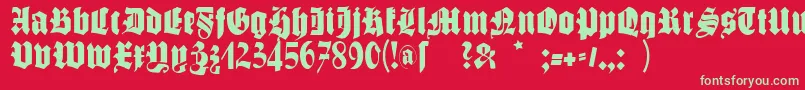 フォントSchmalegotischmk – 赤い背景に緑の文字