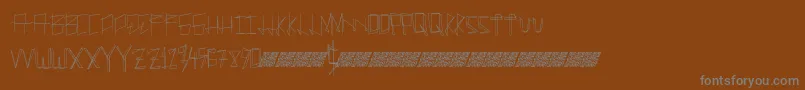 Шрифт Manylines – серые шрифты на коричневом фоне