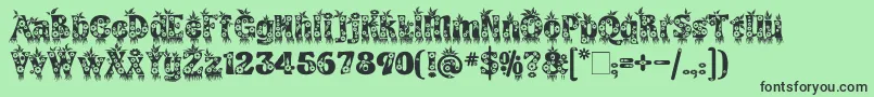 KingthingsAnnexx Font – Black Fonts on Green Background