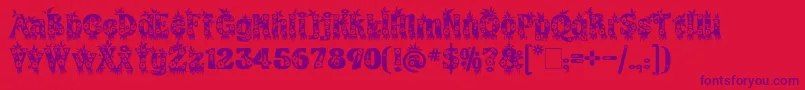 フォントKingthingsAnnexx – 赤い背景に紫のフォント