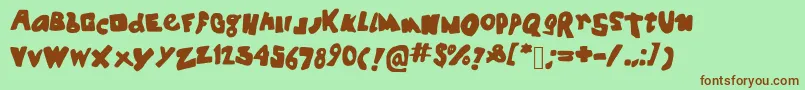 Spookyhouse Font – Brown Fonts on Green Background