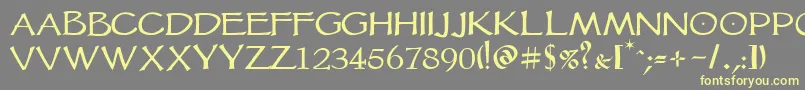 Шрифт Vtcgoblinhand – жёлтые шрифты на сером фоне