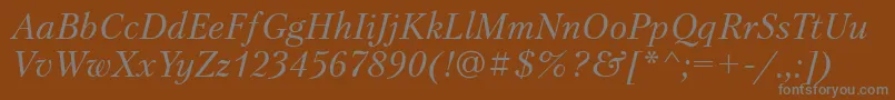 PetersburgttItalic-fontti – harmaat kirjasimet ruskealla taustalla