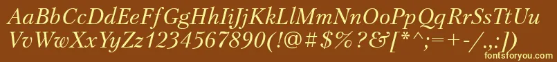 PetersburgttItalic-fontti – keltaiset fontit ruskealla taustalla