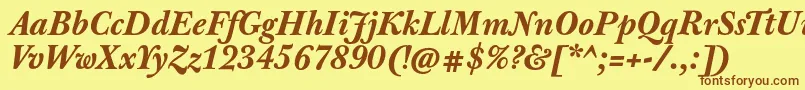 フォントJbaskervilletxnBolditalic – 茶色の文字が黄色の背景にあります。