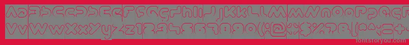 フォントDominiqueHollowInverse – 赤い背景に灰色の文字
