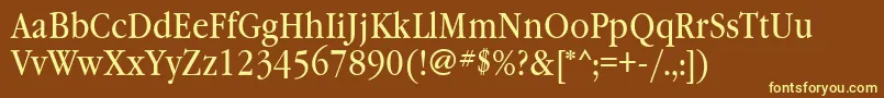Garamondbooknarrowctt-fontti – keltaiset fontit ruskealla taustalla