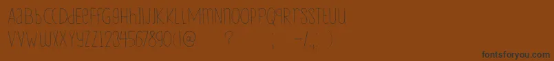DkLampion Font – Black Fonts on Brown Background