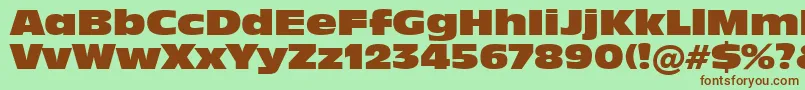フォントIncised901NordBt – 緑の背景に茶色のフォント
