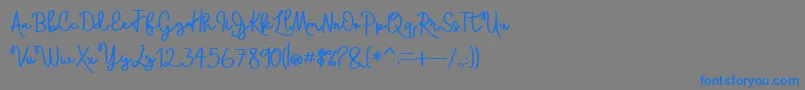 フォントSkolatekaBold – 灰色の背景に青い文字