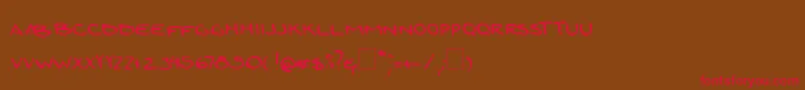 フォントZoi – 赤い文字が茶色の背景にあります。
