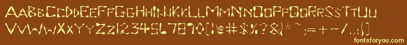 Dinnertime-fontti – keltaiset fontit ruskealla taustalla