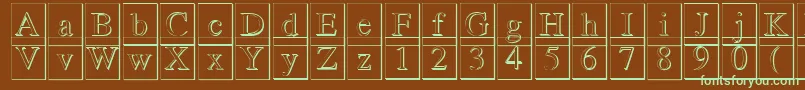Czcionka Romand3DDb – zielone czcionki na brązowym tle