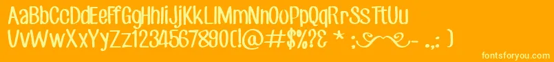 Czcionka CfjackstoryRegular – żółte czcionki na pomarańczowym tle