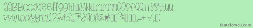 Fonte FunFragment – fontes cinzas em um fundo verde
