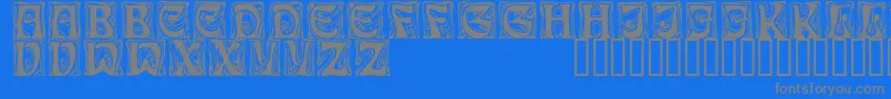 Czcionka Festooncapsssk – szare czcionki na niebieskim tle