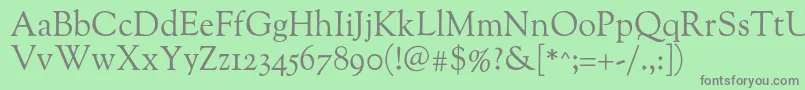 Oflgoudystm Font – Gray Fonts on Green Background