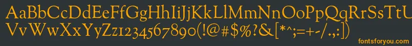 Oflgoudystm Font – Orange Fonts on Black Background