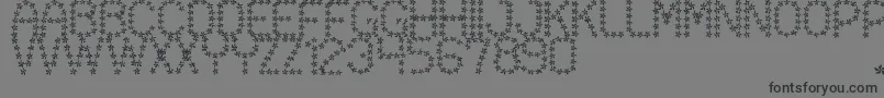 FloweredSt Font – Black Fonts on Gray Background