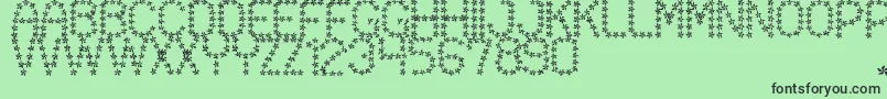FloweredSt-fontti – mustat fontit vihreällä taustalla