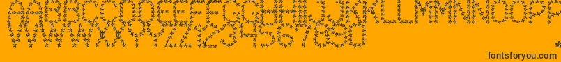 フォントFloweredSt – 黒い文字のオレンジの背景