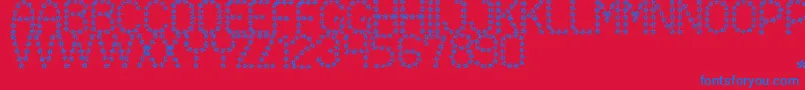 フォントFloweredSt – 赤い背景に青い文字