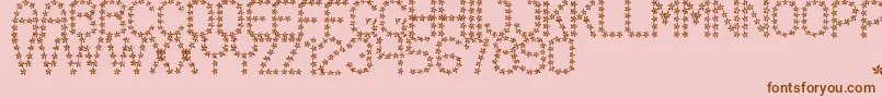 Czcionka FloweredSt – brązowe czcionki na różowym tle