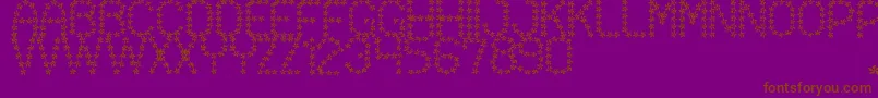 フォントFloweredSt – 紫色の背景に茶色のフォント