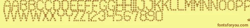 Czcionka FloweredSt – brązowe czcionki na żółtym tle