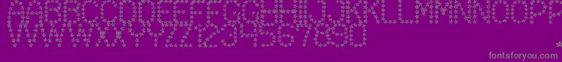 フォントFloweredSt – 紫の背景に灰色の文字