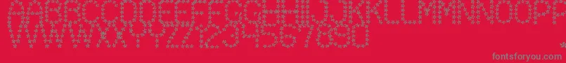 FloweredSt-fontti – harmaat kirjasimet punaisella taustalla
