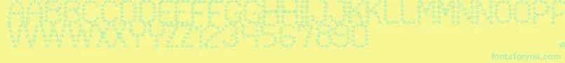 FloweredSt-Schriftart – Grüne Schriften auf gelbem Hintergrund