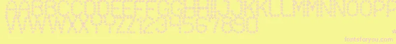 FloweredSt-fontti – vaaleanpunaiset fontit keltaisella taustalla