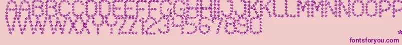 FloweredSt-fontti – violetit fontit vaaleanpunaisella taustalla