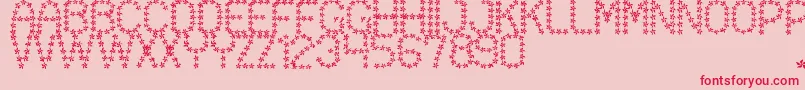フォントFloweredSt – ピンクの背景に赤い文字